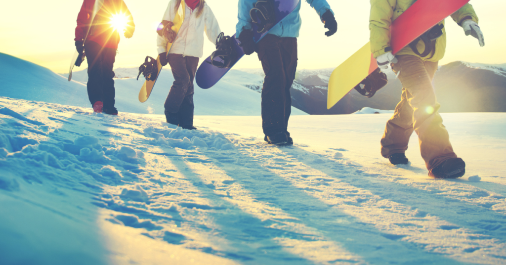 Snowboarders in outdoor winter gear