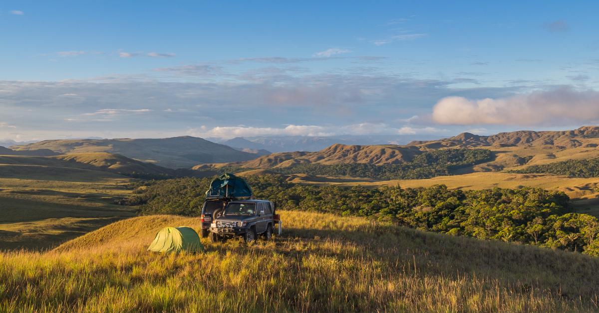 Overlanding vehicle on picturesque mountain