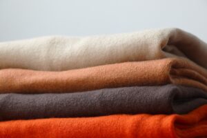 Stack of merino wool fabrics