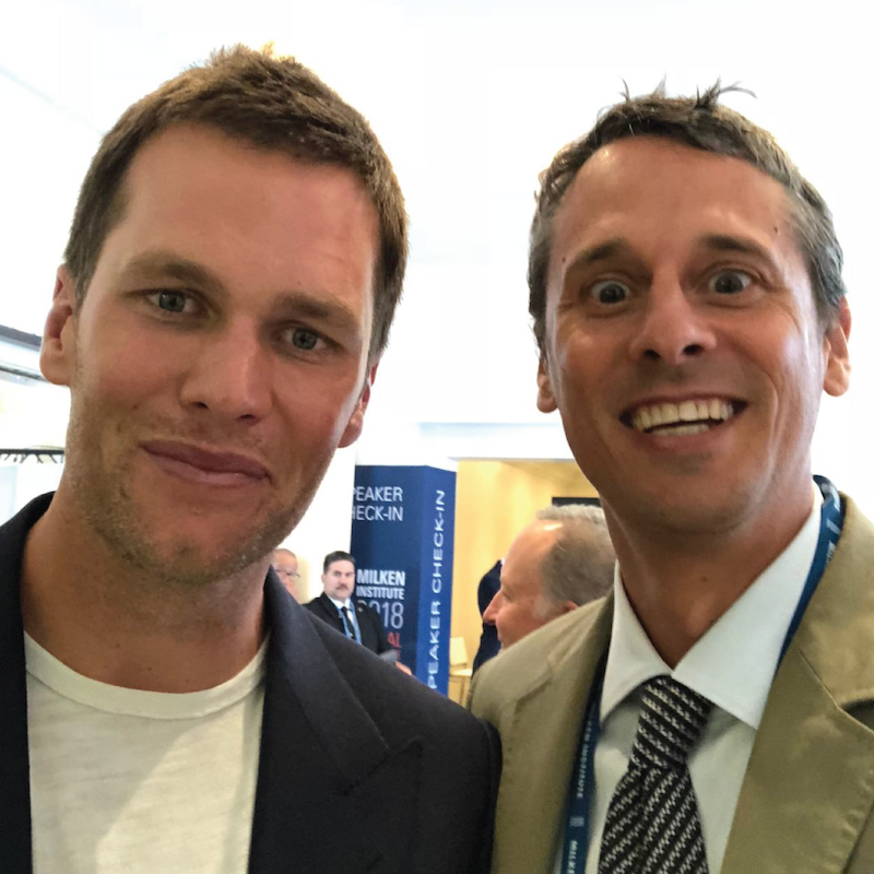 Photo of Seth Casden with Tom Brady. Link to visit Celliant's LinkedIn profile.